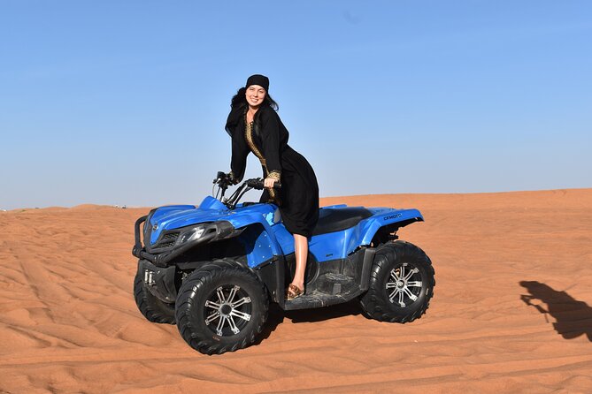 Dubai: Desert Safari, Quad bike and Sand boarding with BBQ Dinner - Sunset photos and sandboarding on the red dunes