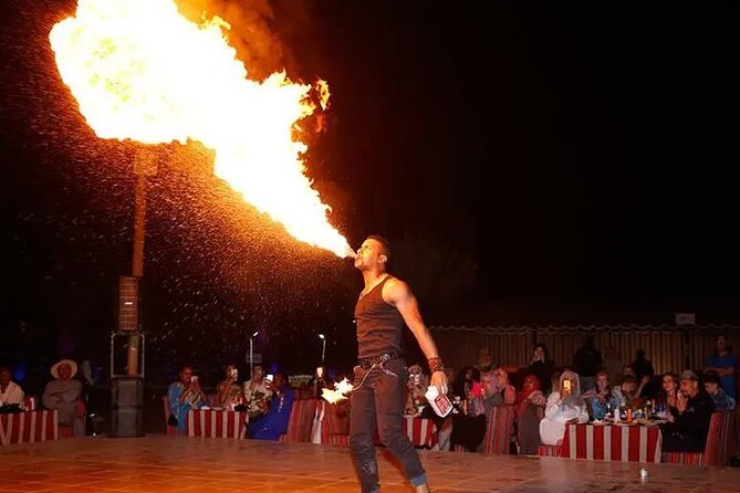 Dubai Desert Safari: Quad Bike, Camel Ride and BBQ Dinner - Belly dance, tanoura, music, and fire