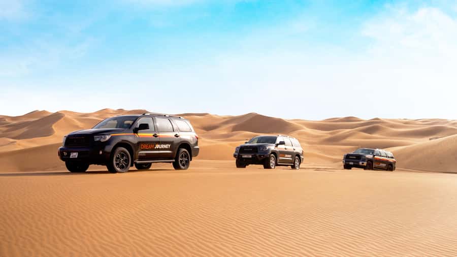 Dubai Desert Safari - Sandboarding, Quad Bike & BBQ Options - Sunset photos from the highest dune