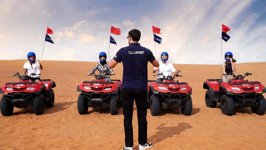 Dubai Desert Safari - Sandboarding, Quad Bike & BBQ Options - Sandboarding on soft desert slopes