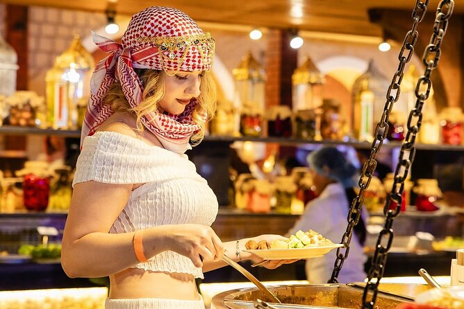 Dubai Desert Safari Tour with Quad Bike for 60mins & BBQ Dinner. - A short camel ride, not a camel trek