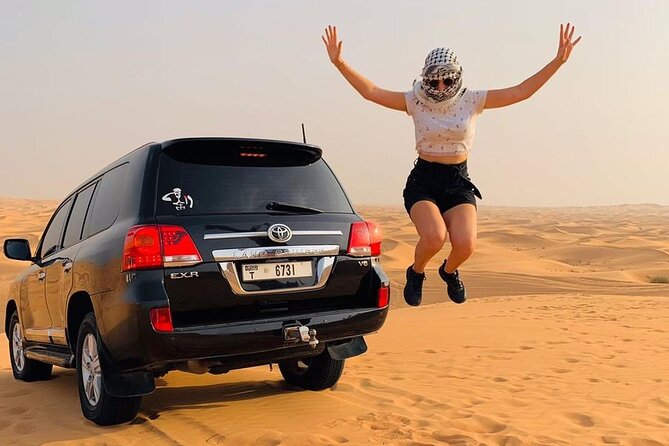 Dubai desert safari with 4x4 Dune Bashing,Camel Ride sand board - Red dunes, big views, and a busy six-hour outing