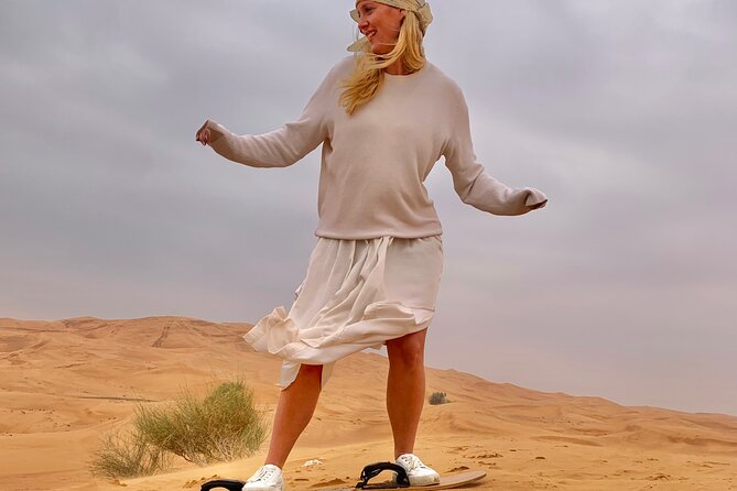 Dubai desert safari with 4x4 Dune Bashing,Camel Ride sand board - Belly dance, Tanura, Zumba, and fire performances