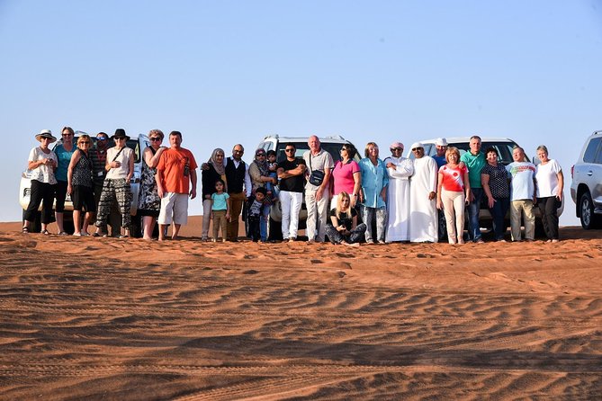 Dubai Desert Safari with BBQ and 4WD Land Cruiser Dune Bashing - Belly dancing, Tanoura, and the fire show