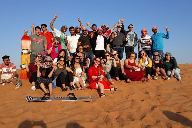 Dubai Desert Safari with BBQ Dinner, Camel Ride, and Shows - Henna, local dress, and camp activities