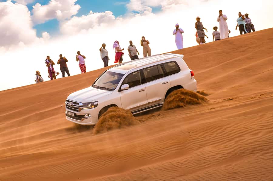 Dubai: Desert Safari with BBQ Dinner & Quad Biking Options - The red dunes, from photo stop to sandboard
