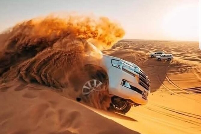 Dubai Desert Safari with Camel Ride, Sand surf, & BBQ Dinner - From hotel pickup to the desert meeting point