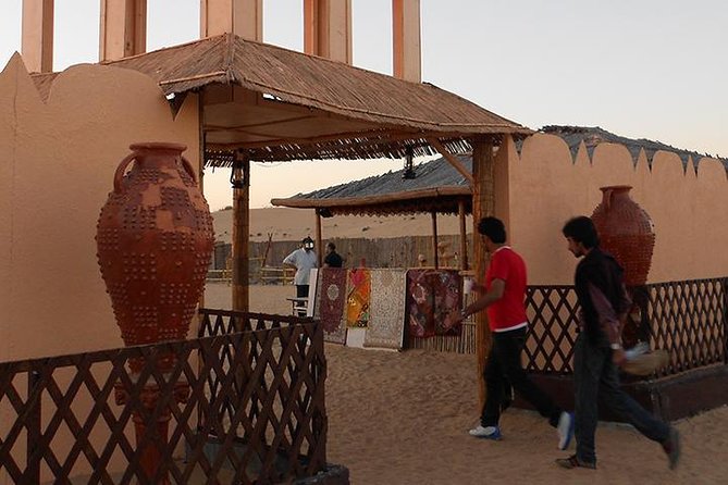 Dubai Desert Safari with Camel Ride, Show, BBQ and Transfers - Leaving Dubai for the evening dunes