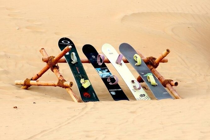 Dubai Desert Safari with Camel Riding, Sand Boarding,BBQ Dinner and 3 Live Shows - BBQ dinner, drinks, and what the price covers