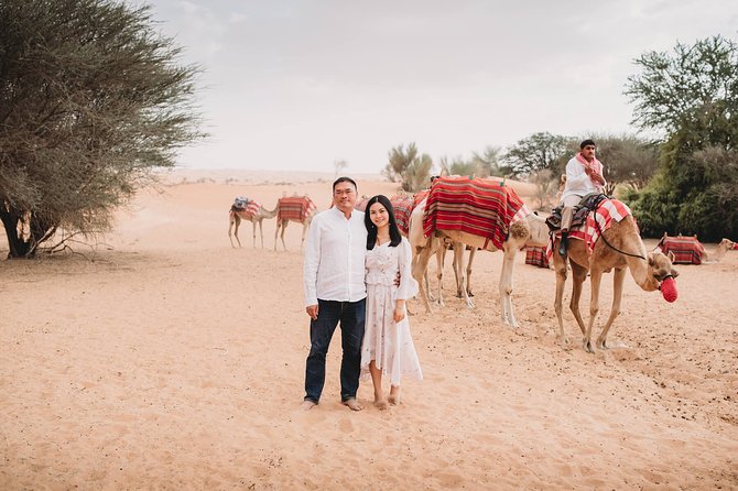 Dubai Desert Safari With Camp Activities and ATV Self Drive Quad Bike - A Bedouin-style camp after dark