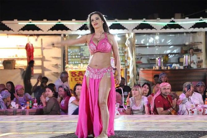 Dubai Desert Safari with Dance show, Sand Boarding, Camel & BBQ - A short camel ride and Bedouin-style camp