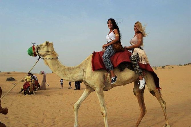 Dubai Desert Safari with Dance show, Sand Boarding, Camel & BBQ - Guides matter more than the low price suggests