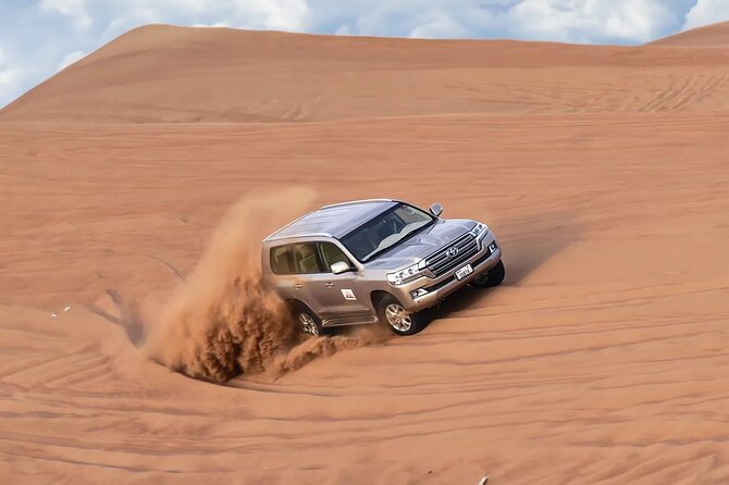 Dubai Desert Safari with Dune Bashing & Live Shows - BBQ dinner and three evening performances