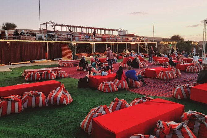 Dubai Desert Safari with Quad Bike, Camel Ride, Dinner and Show - Guide service and the value of shared transport
