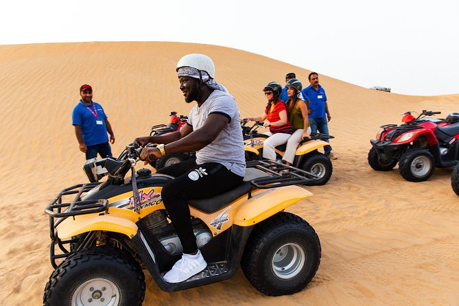Dubai Desert Safari with Quads, BBQ Dinner, Camel ride, & Shows - Belly dancing and the spinning tanoura show