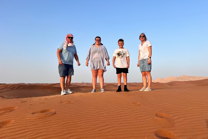 Dubai Desert Safari - Pickup, vehicles, and the first desert drive