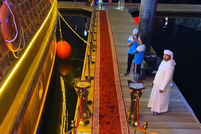 Dubai Dhow Cruise Dinner Al Seef Creek Multicusine - Boarding a traditional dhow on Dubai Creek