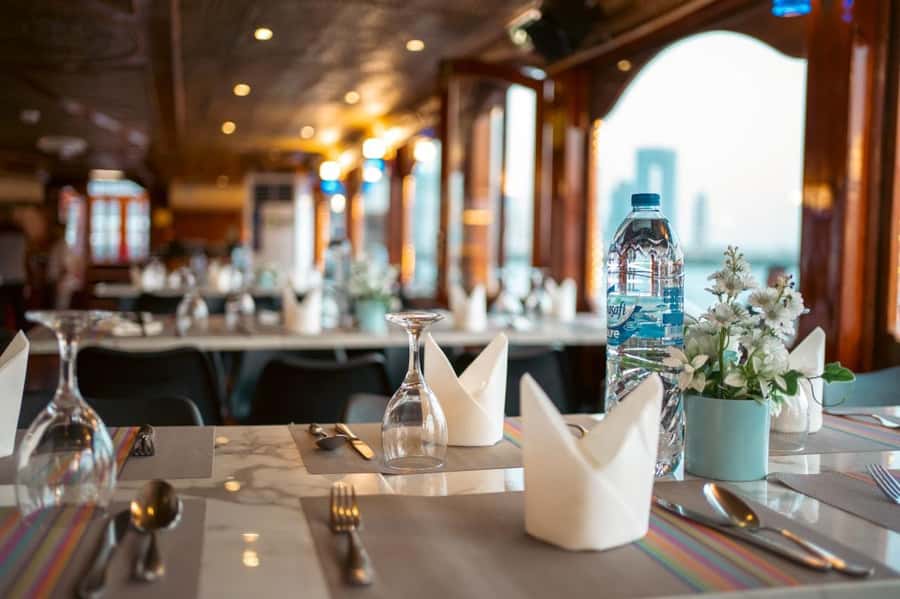 Dubai: Dinner Dhow Cruise with Live Entertainment Al Seef - Dubai Creek from a wooden dhow