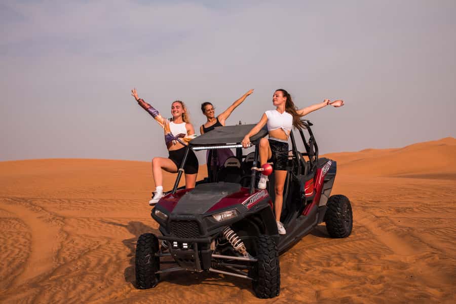 Dubai: Dune Buggy Desert Safari, Camel Ride & Sandboarding - Sandboarding turns the dunes into a playground