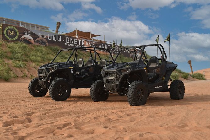 Dubai: Dune Buggy Safari and Camel Ride with Transportation - Driving a 1000cc RZR through Dubai’s red dunes