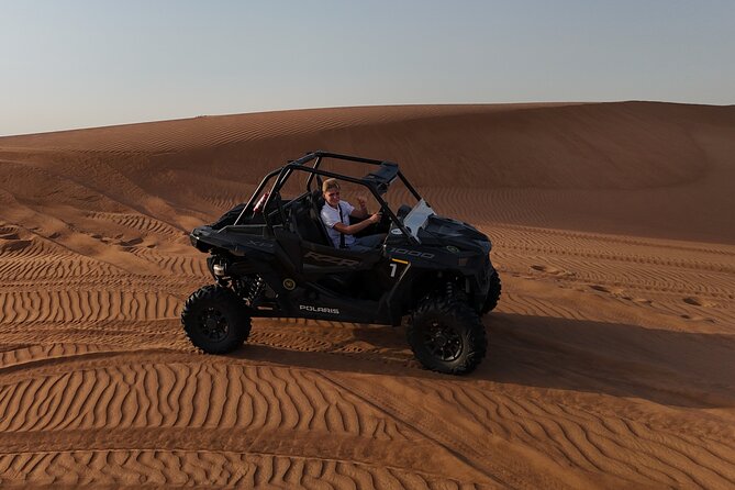 Dubai: Dune Buggy Safari and Camel Ride with Transportation - Sandboarding adds a quieter change of pace