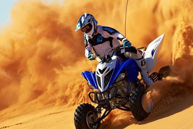 Dubai Evening 4x4 Desert Safari ATV Bike ,Camel Ride , BBQ Dinner - A 30-minute quad-bike ride in a fenced area