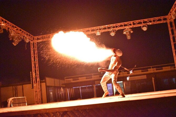Dubai Evening Desert Safari With Transfers Dune Bashing & Dinner - Six live performances in one evening