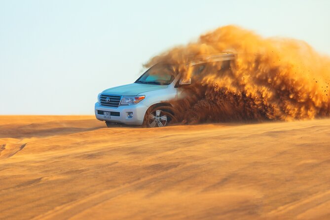 Dubai Evening Desert Safari With Transfers Dune Bashing & Dinner - Lahbab: quad bikes, dune bashing, and sunset