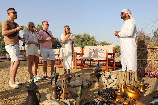 Dubai Evening Heritage Safari by Vintage G Class Al Marmoom Oasis - Arabic coffee, flatbread, and the dinner table