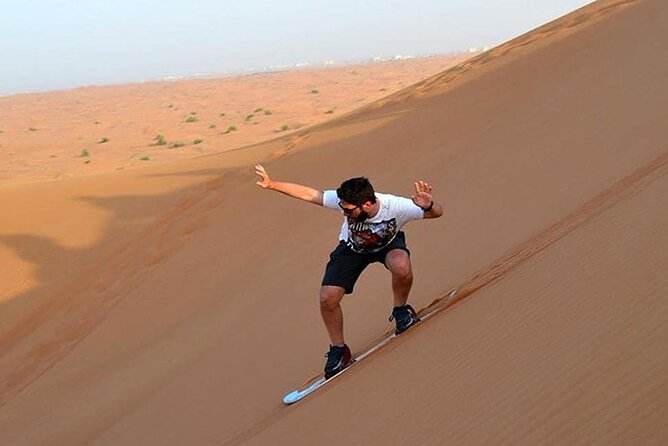 Dubai Evening Private Desert Safari with BBQ Dinner - Thirty minutes of dune bashing and sandboarding