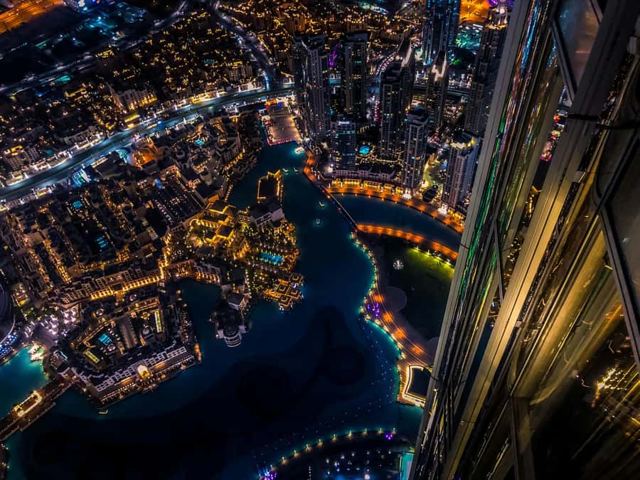 Dubai: Evening Tour and Burj Khalifa Entrance Ticket - Madinat Jumeirah and its softly lit canals