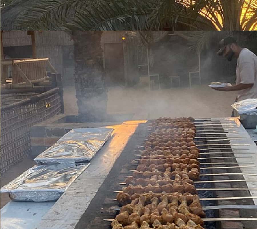 Dubai: Evening Tour with Quad Biking, Camel Ride, and BBQ - From your hotel to the Al Badayer red dunes