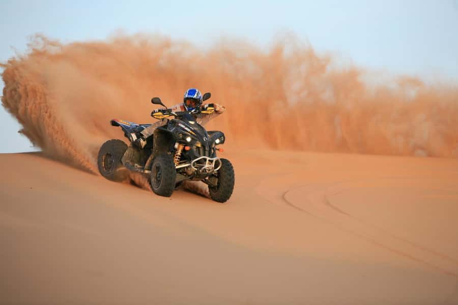 Dubai: Evening Tour with Quad Biking, Camel Ride, and BBQ - Quad biking: the most independent part of the evening