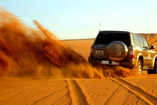 Dubai Evening4x4Desert Safari BBQ Dinner,4 Live Shows,Camel Ride - Leaving Dubai for the red dunes