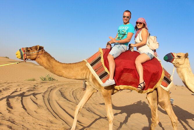 Dubai Evening4x4Desert Safari BBQ Dinner,4 Live Shows,Camel Ride - Tanura, belly dance, and fire performance