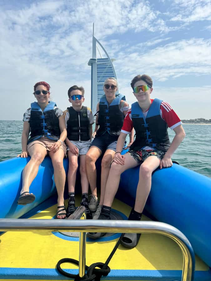 Dubai: Guided Speedboat Tour with City Sights & Ice Cream. - Palm Jumeirah and the approach to Atlantis