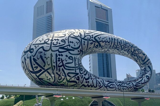 Dubai Half Day City Tour With Burj Khalifa Ticket - Old Souk, spices, and the Gold Market area