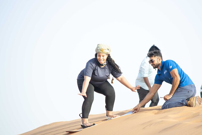 Dubai Half-day Red Dunes bashing with Sandboarding, Camel &Falcon - A short camel ride in the desert
