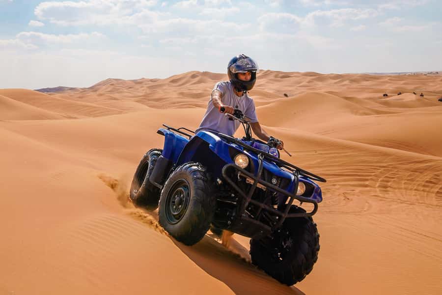 Dubai: Helicopter Ride, Desert Safari, Camels & Refreshments - Dune bashing in a professional 4WD