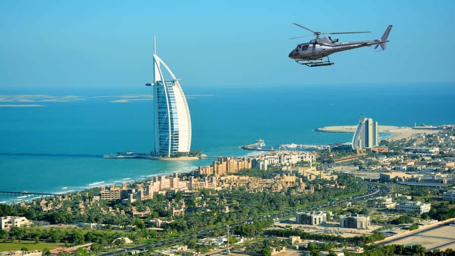 Dubai: Helicopter Ride, Old Town Walking Tour, Abra & Snacks - Key Points