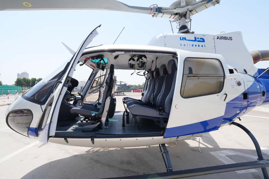 Dubai: Helicopter Ride, Old Town Walking Tour, Abra & Snacks - Walking Through Al Fahidi and Al Seef