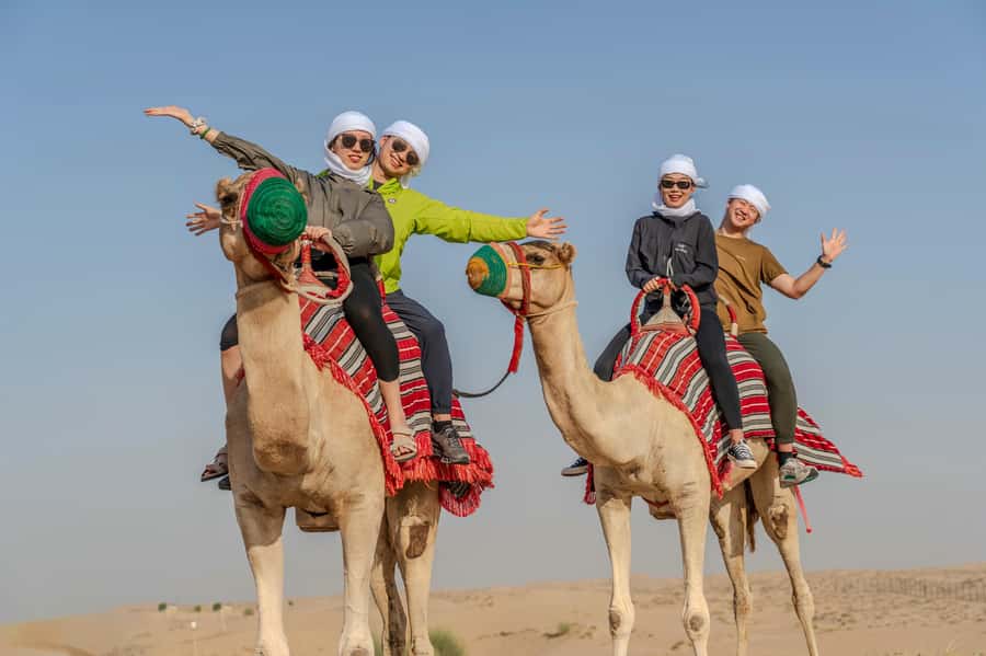 Dubai: Heritage Safari, Camel Ride & Al Marmoom Oasis Dinner - Sunset, falcons, and the evening program