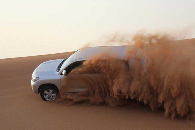 Dubai High Red Dunes Extreme Desert Safari Adventure with BBQ Dinner - Henna, campfire time, and traditional dress