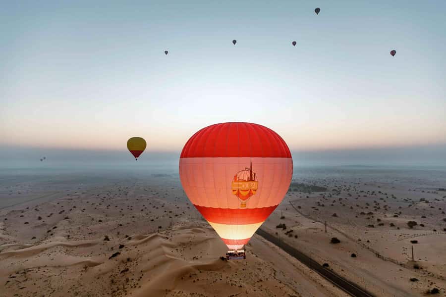 Dubai: Hot Air Balloon Ride with Camel Ride & Falcon Show - Breakfast at the Bedouin camp