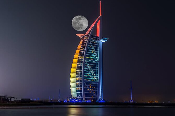 Dubai Inside Burj Al Arab Tour Including Food and Transfer Option - Arriving by buggy from Jumeirah Beach Hotel