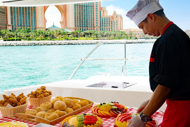 Dubai Marina Yacht Tour with Optional Breakfast or BBQ - Palm Jumeirah, skydivers, and Atlantis