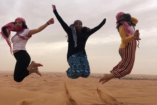 Dubai: Morning Desert Safari with Camel Ride and Sand boarding - Guides, pickup, and the pace of the morning