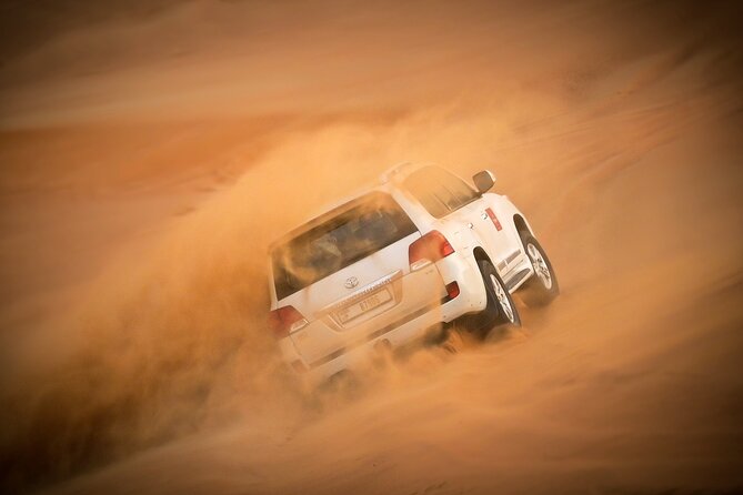 Dubai Morning Desert Safari with Quad Biking & More Activities - Quad Biking in the Enclosed Desert Area