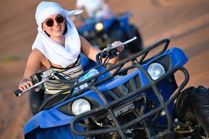Dubai Morning Evening Desert Safari,Sand boarding and Camel ride - Sandboarding gives you a hands-on desert activity