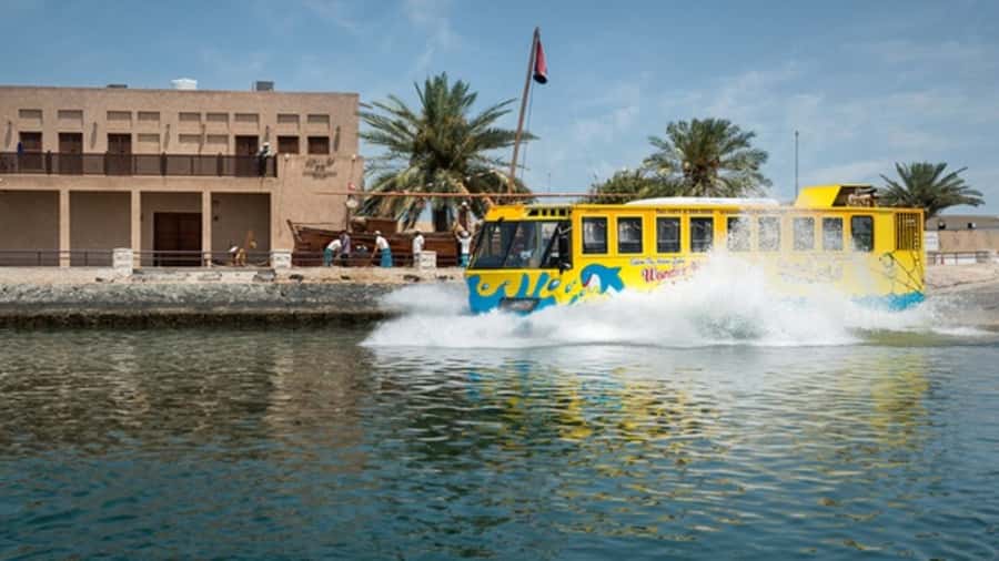 Dubai: Old town tour with Wonder Bus, souks, Creek and Guide - What the guide adds to the ride